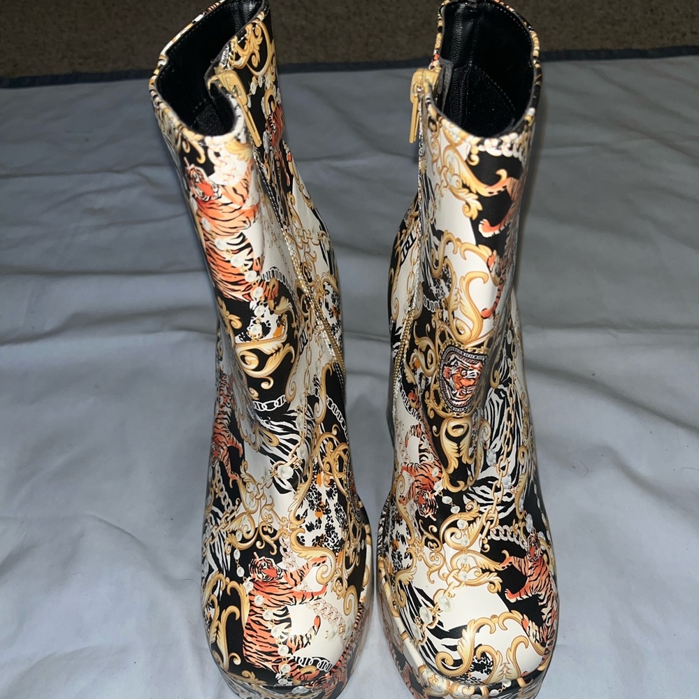 Bamboo brand ankle boots featuring a baroque/chain/pattern with chunky heel.